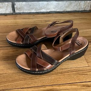 Clarks brown/tan sandals in new condition.